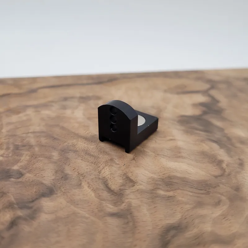 Articulated trigger plate
