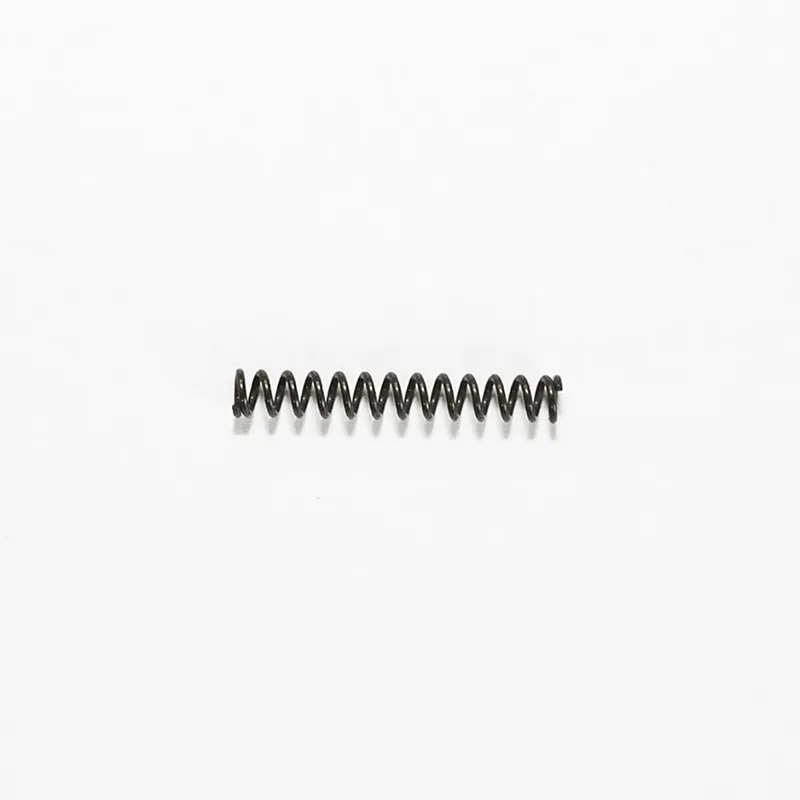 Cartridge latch body spring